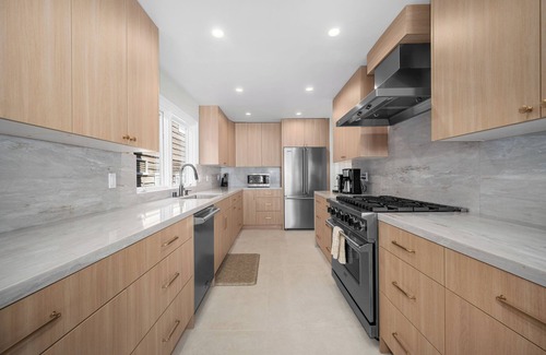 Balboa Peninsula House | Just Renovated Bay Facing Coastal Home with a Dock