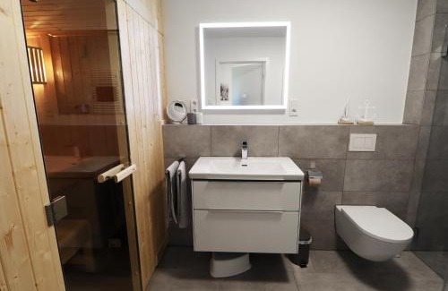 Tossens Apartment | KÜSTE33/20 – Exklusive Ferienwohnung mit Sauna & nah am Strand!