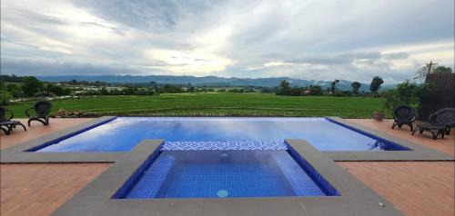 Canloan City House | Kalaparan Farm House by HiveRooms