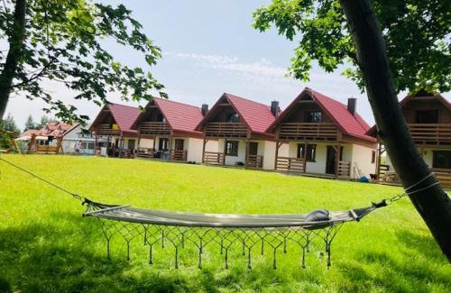 Stare Sady Resort | KALINOWY SAD DOMKI z JACUZZI i SAUNĄ