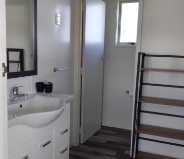 Raglan House | Karoro the beach front bach with views to die for!