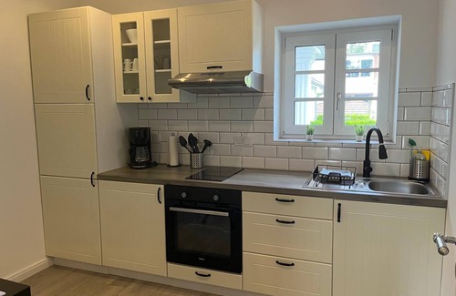 Groemitz Apartment | Kavaliershaus Erdgeschoss mit Eigener Terrasse im Henriettenhof