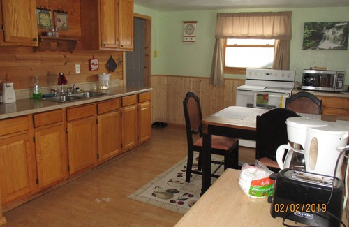 Munising House | Kayakers Cove overlooks Munising Bay bike to town