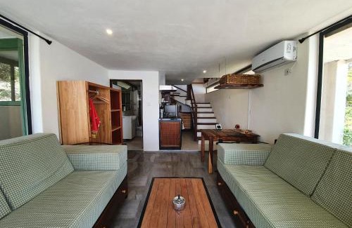 Komanyana Cabin | Kayube Estate Bungalows