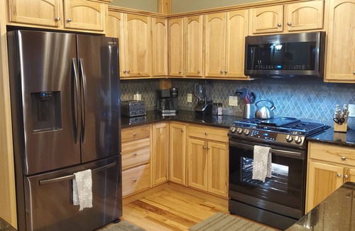 Dollar Bay House | Kemp's Rentals Luxurious Executive Retreat Portage Lake-Beach-Firepit & Pavilion