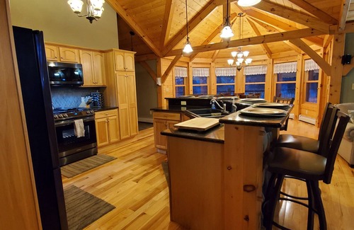 Dollar Bay House | Kemp's Rentals Luxurious Executive Retreat Portage Lake-Beach-Firepit & Pavilion