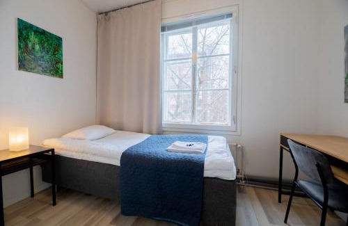 Varkaus Apartment | Keskusta sviitti parvekkeella ja pyykinpesukoneella Vanha Postitalo