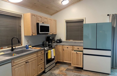 Ahmeek House | Keweenaw County- gorgeous new ADA accessible ground floor South Room in Ahmeek