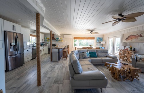 Treasure Cay House | Key Lime House with a 100’ dock: A Solar-Powered Waterfront Oasis on Black Sound