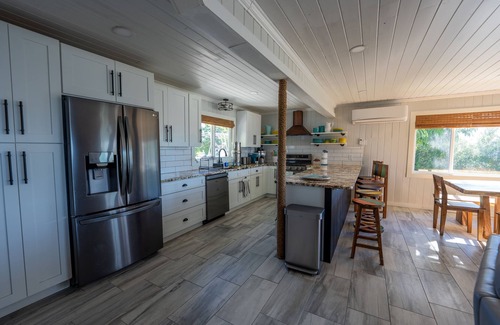 Treasure Cay House | Key Lime House with a 100’ dock: A Solar-Powered Waterfront Oasis on Black Sound