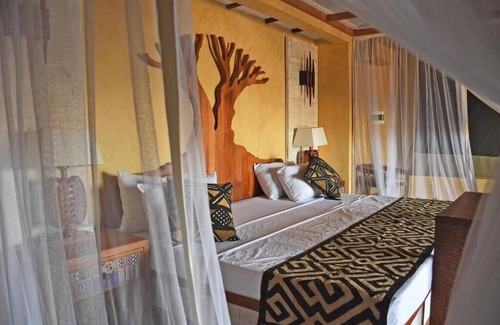 Tsavo East Cabin | KIBOKO RIVER CAMPnA LUXURIOUS ESCAPE IN THE WILDERNESS.