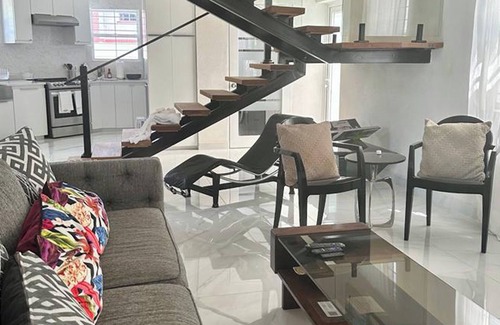 Prospect House | Kick back and relax in this calm, stylish space