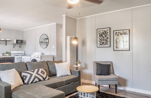 Abilene Condo | Kick back and relax in this calm, stylish space.