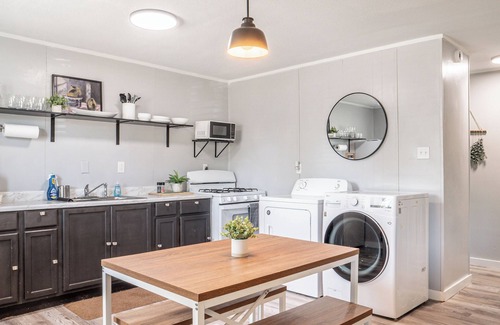 Abilene Condo | Kick back and relax in this calm, stylish space.