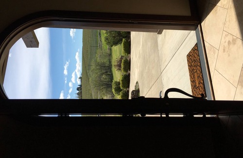 Yakima House | King bed in a room with a full bath in our home; a country setting with a view.