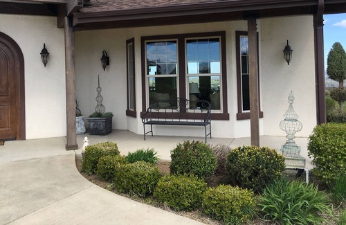Yakima House | King bed in a room with a full bath in our home; a country setting with a view.