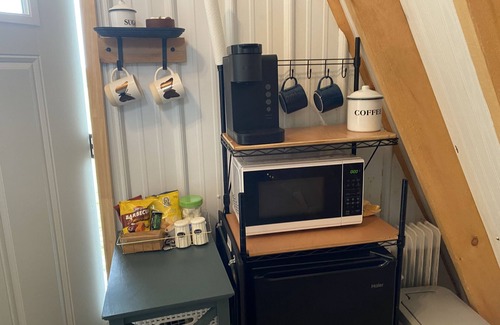 Mammoth Cave RV Rental | King bed in Tulip Glamping Aframe at Noble Pine Campground