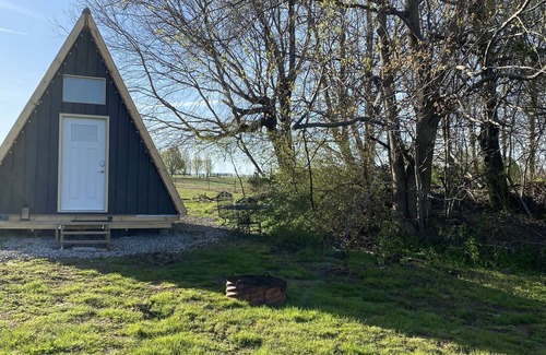 Mammoth Cave RV Rental | King bed in Tulip Glamping Aframe at Noble Pine Campground