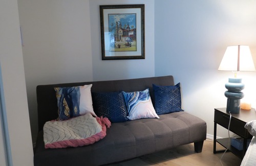 Delta House | King bed private suite with 65' 4K television