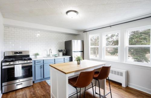 Lockport Apartment | King Bed, Work Desk, Near Hwy, Laundry Room Access