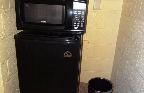 Mount Ida Apartment | King Guest Room located at the Joplin Inn at the entrance to Mountain Harbor, just 2 1/2 miles from Lake Ouachita. by RedAwning