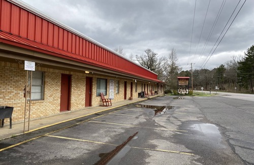 Mount Ida Apartment | King Guest Room located at the Joplin Inn at the entrance to Mountain Harbor, just 2 1/2 miles from Lake Ouachita. by RedAwning