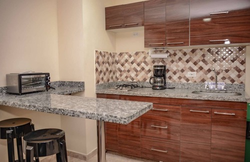 Astorga Apartment | King One bedroom AC HOT TUB ELEVATOR 2 Flat screens