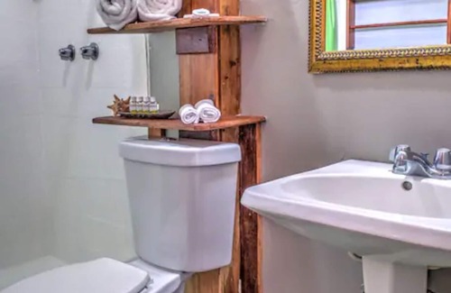 Antoneys Cay Resort | King & Queen Room w/balcony Land's End Hotel Resort West End Roatan Honduras