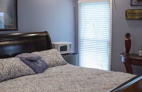 Mint Hill Bed & Breakfast | King size bed on quiet wooded property, near 485