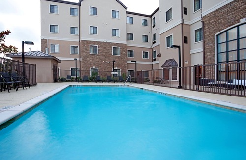 West San Antonio Condo | King Suite Near Sea World | FREE Breakfast Everyday + Pool Access!