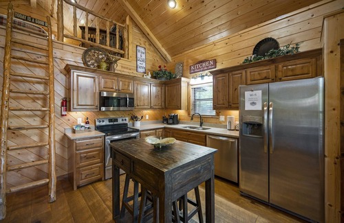 Broken Bow Cabin | Kingfisher ~ Riverfront cabin with play set, hot tub, kayaks, and river access