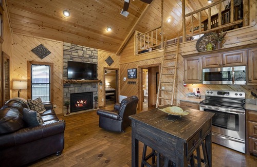 Broken Bow Cabin | Kingfisher ~ Riverfront cabin with play set, hot tub, kayaks, and river access