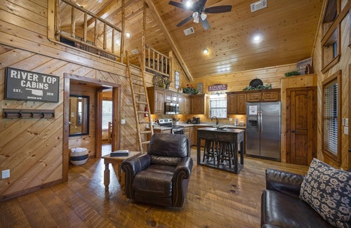 Broken Bow Cabin | Kingfisher ~ Riverfront cabin with play set, hot tub, kayaks, and river access