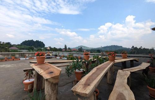 Fort Portal Apartment | Kirungi Vacation Homes - Large Bamboo Studio room with access to top roof