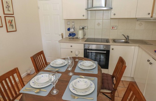 Scurlage Cottage | KITES - 52 GOWER HOLIDAY VILLAGE, pet friendly in Port Eynon