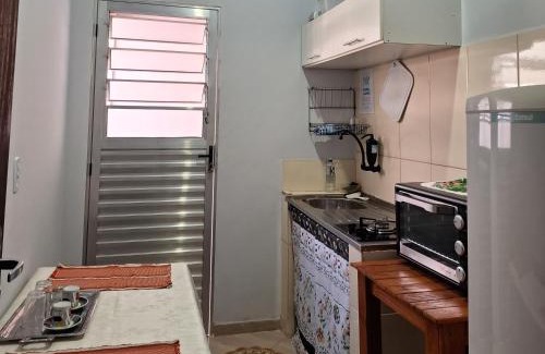 Capao Bonito House | Kitnet com ar condicionado e banheiro externo