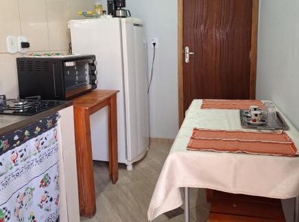 Capao Bonito House | Kitnet com ar condicionado e banheiro externo