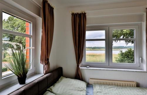 Neuensien Apartment | Kleines Apartment mit traumhaftem Seeblick, Ferienpark Seedorf Zeesenhaus Nr 4