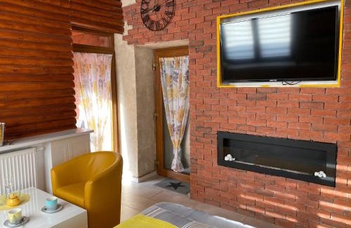 Gniezno Apartment | Klinkierowy Apartament z wanną dla Dwojga