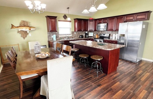 Golden Meadow House | Knot Workin - Boat Access - Island Realty