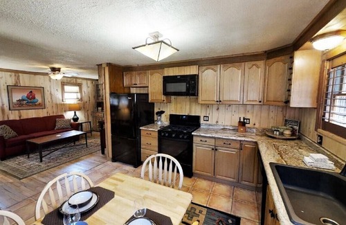 Red River House | Knotty & Nice - In Town - Pet Friendly! - Gas Fireplace - Washer/Dryer - Gas Gri