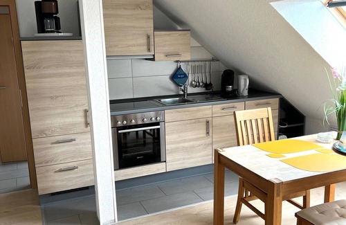 Altenhagen Apartment | Komf. Mod. Apartment with sitting area in the garden near Steinhuder Meer
