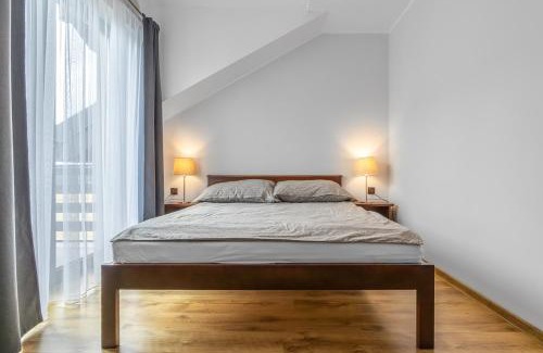 Ostrowo House | Komfort i spokój blisko natury - Apartamenty i pokoje ARKO