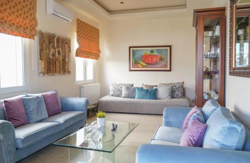 Kato Stalos Apartment | Kostoula's House Beachfront by 8essentially