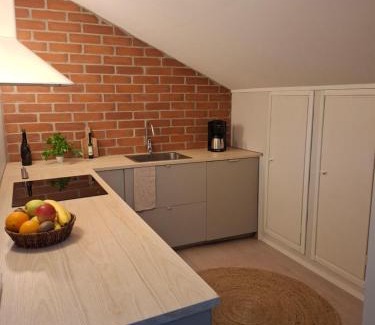 Laitila Apartment | Kotoisa kattohuoneisto