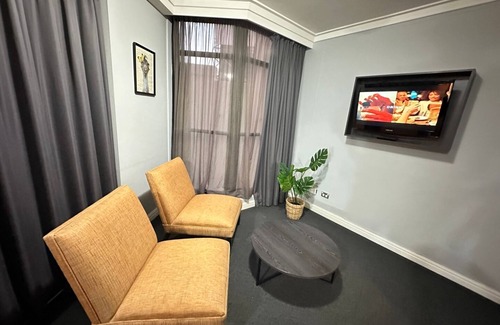 Haymarket Apartment | KozyGuru | CBD Queen Bed Studio Cozy and Convenient