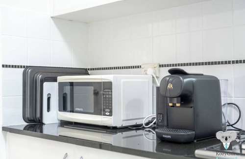 Homebush West Apartment | KozyGuru | Homebush West | 3-Beds Apt with Parking