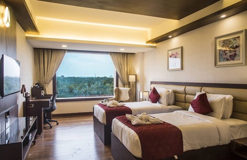 Kozhikode Hotel | Kpm Tripenta Hotel