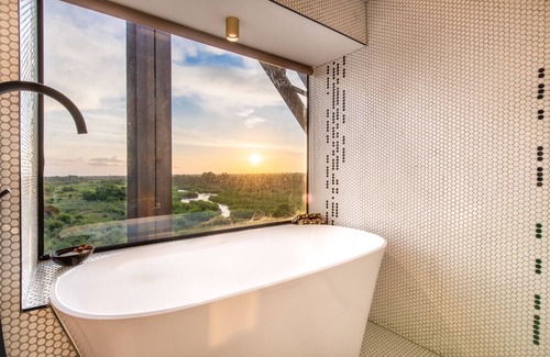 Skukuza Hotel | Kruger Shalati - Train on the Bridge and Garden Suites