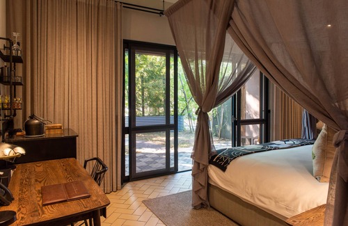 Skukuza Hotel | Kruger Shalati - Train on the Bridge and Garden Suites
